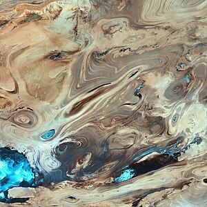 A facsinating, psychedelic satellite image of a desert.