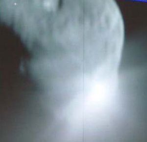 View from Deep Impact's flyby showing the impactor colliding with comet Tempel 1