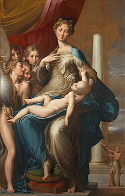 A lady holding a baby with ladies on the side of them