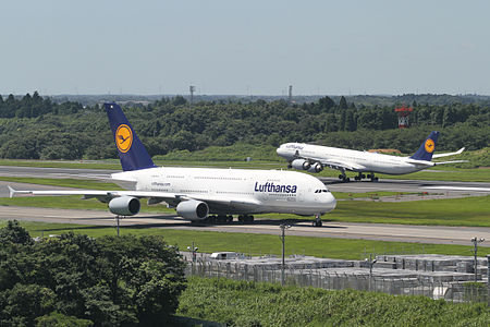 Airbus A380-841 and Airbus A340-642X of Lufthansa at Narita International Airport.