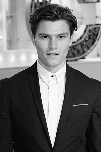 A man with a strong positive canthal tilt (model Oliver Cheshire)
