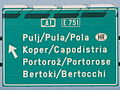 Trilingual traffic sign on A1 near Koper.jpg Item:Q478
