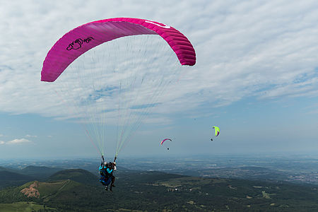 Paragliders on the puy de Dôme, France.