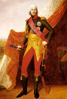 Retrato de cuerpo entero de un mariscal de Napoleón en uniforme completo con sus condecoraciones, en la entrada de una gran tienda, sosteniendo su bastón de mariscal en la mano derecha y apoyado con la mano izquierda en su sable.