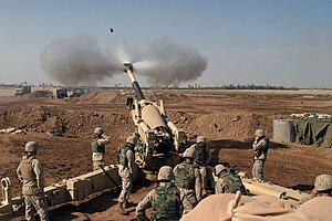 M-198 155mm Howitzer gun crew of 4th Battalion, 14th Marines